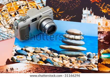 Camera and photo printouts (my photos), travel background