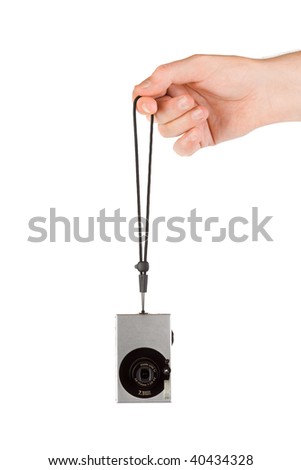 Hand and photo camera isolated on white background