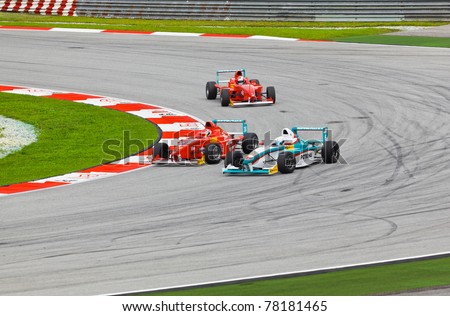 SEPANG, MALAYSIA - APRIL 10: Unidentified drivers and their cars on track at race of JK Racing Series on April 10 2011 in Sepang, Malaysia