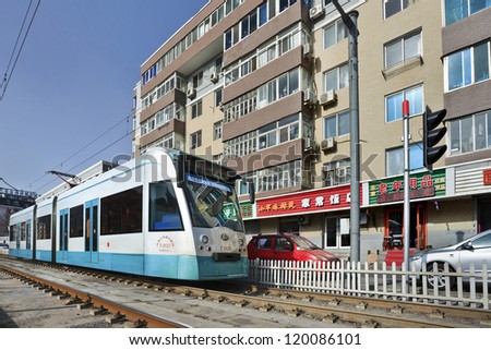 DALIAN-NOV. 26: Tram in Dalian, a Chinese city where are no longer many bicycles. Dalian has an efficient public transport with the country's second oldest tram-system on Nov. 26, 2012 in Dalian.