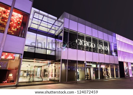 DALIAN-CHINA-NOV. 7. Armani outlet at night. China became world\'s second-largest luxury goods consumer. Its total luxury goods consumption reached $10.7 billion at March 2011. Dalian, Nov. 7, 2012.