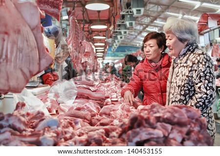 BEIJING-MARCH 14. Dongjiao indoor meat market. The latest meat scandal in China, which has seen rat meat passed off as lamb, has raised questions about China\'s food safety. Beijing, March 14, 2012.