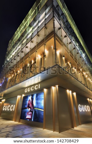 SHANGHAI-JUNE 10. Gucci store at night. China is the worldÃ?Â¢??s fastest growing luxury goods market. Analysts expect China surpass U.S. and Japan in 2015 to take the top spot. Shanghai, June 10, 2013.