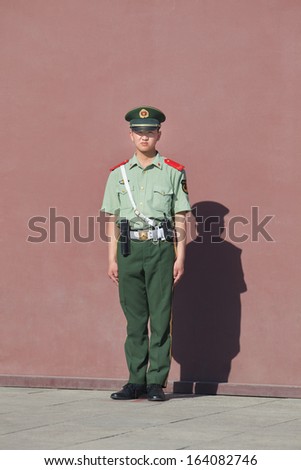 BEIJING-MAY 29. Honor guard at Tiananmen. Honor guards are provided by the People\'s Liberation Army at Tiananmen Square for flag-raising ceremony and presence on Tiananmen. Beijing, May 29, 2013