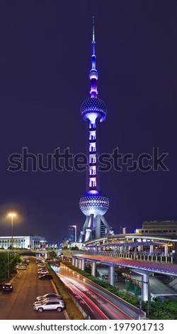 SHANGHAI-JUNE 4, 2014. Oriental Pearl Tower at twilight. With 470 meter the Oriental Pearl is one of ShanghaiÃ¢Â?Â?s tallest buildings, located at Lujiazui in Pudong district, by the side of Huangpu River.