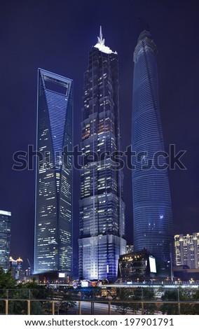 SHANGHAI-JUNE 4, 2014. Jin Mao, Shanghai Tower and Shanghai World Financial Center at Lujiazui. Lujiazui is a national-level development finance and trade zone designated by the Chinese government.