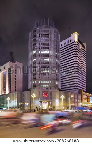 KUNMING-JULY 3, 2014. China Bank office at night. Established in 1920 as first private local commercial bank in Philippines for Chinese-Filipino businessmen. Now, it is a full-service universal bank.