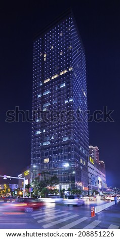 KUNMING-JULY 3, 2014. Golden Eagle building at night. Golden Eagle Retail Group is an investment company, mostly engaged in development and operation of stylish high-end department stores in China.
