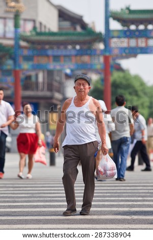 BEIJING-JUNE 9, 2015. Fit Chinese elder. The elderly population (60 or older) in China is about 128 million, one in every ten people, the world\'s largest. China will have 400 million elderly by 2050.