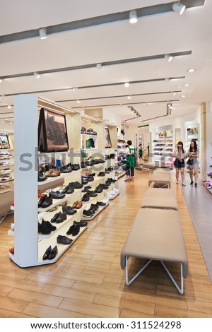 BEIJING-AUGUST 21, 2015. Hotwind outlet interior. It is a well-known fast-growing retail brand with more than 90 chain stores in Chinese cities and 1500 people to operate various types of footwear.