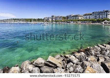GENEVA - JULY 25: Lake shore of Geneva on July 25, 2011. Lake Geneva is the largest body of water in Switzerland. It is very famous for its deep blue and remarkably transparent waters.