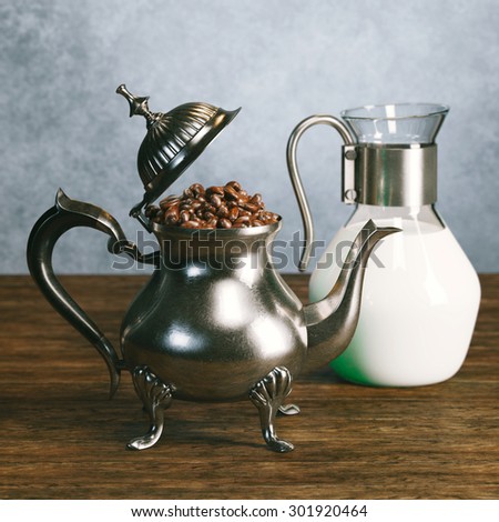 Still life with stylish coffeepot and pot of milk