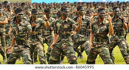 KUALA LUMPUR, MALAYSIA - SEPT. 30: Battalion Lekir group performs war dance at Convocation Festival at National Defense University Of Malaysia, Kuala Lumpur, Malaysia on September 30, 2011.