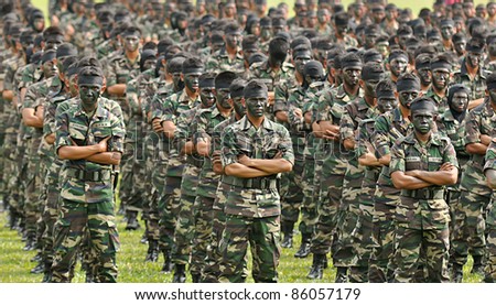 KUALA LUMPUR, MALAYSIA - SEPT. 30: Army Students ready to perform war dance at Convocation Festival at National Defense University Of Malaysia, Kuala Lumpur, Malaysia on September 30, 2011.