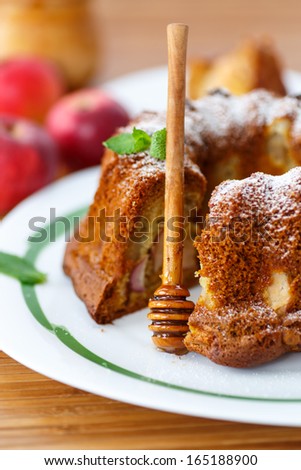 apple and honey cake on a plate on the table