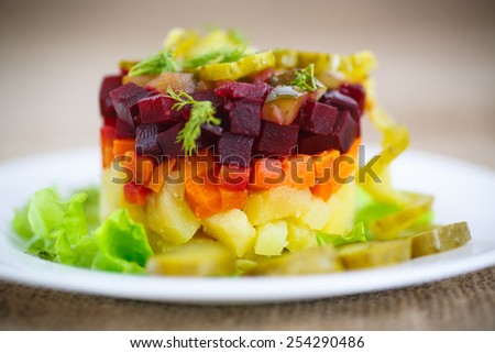 salad of boiled vegetables with beetroot and dill