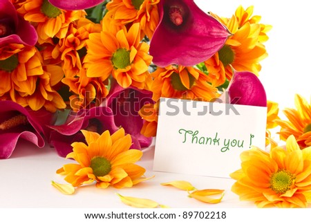 bouquet of calla lilies and orange chrysanthemums on white background