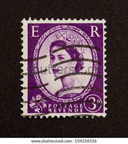 ENGLAND - CIRCA 1970: Stamp printed in the UK shows the the head of state (Queen Elizabeth II), circa 1970