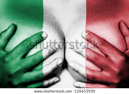 Sweaty upper part of female body, hands covering breasts, flag of Italy