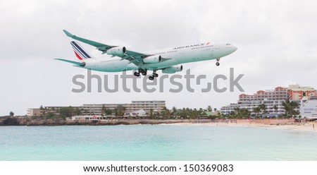 ST MARTIN, ANTILLES - July 19: the tourist office and Air France signs an agreement to strengthen their partnership (joint communication plan). Daily A340 about to touch down in July 19. 2013 at SXM.