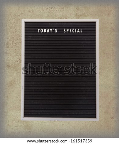 Empty restaurant board stand (people stopper) with today\'s special isolated on vintage background