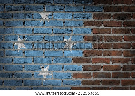 Very old dark red brick wall texture with flag - Micronesia