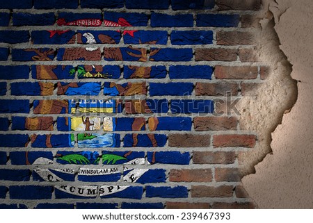 Dark brick wall texture with plaster - flag painted on wall - Michigan