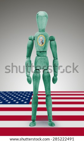 Old wood figure mannequin with US state flag bodypaint - Washington