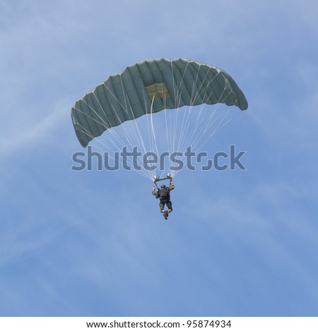 LEEUWARDEN,FRIESLAND,HOLLAND-SEPTEMBER 17: A parachutist of the dutch army at the Airshow on September 17, 2011 at Leeuwarden Airfield