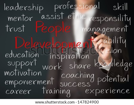 business man writing people development concept