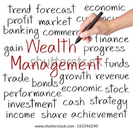 business hand writing wealth management concept
