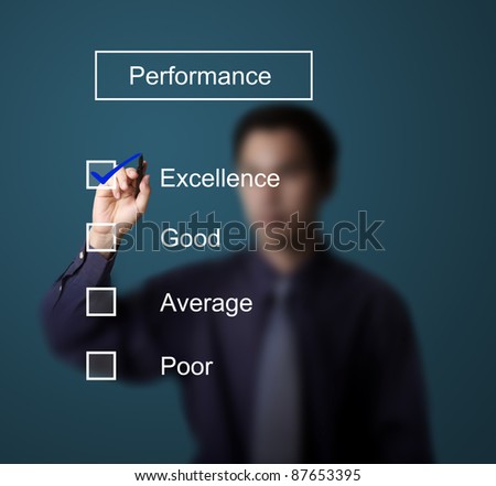 business man checking  excellence on performance evaluation form