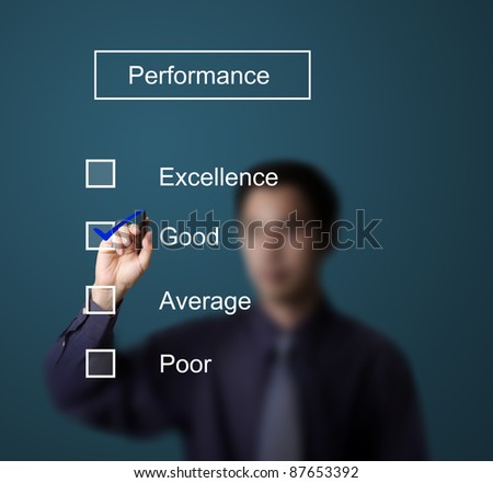 business man checking  good on performance evaluation form