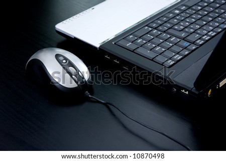 Laptop with mouse (high contrast image)