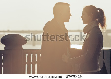 first date lovers at sunset near the water
