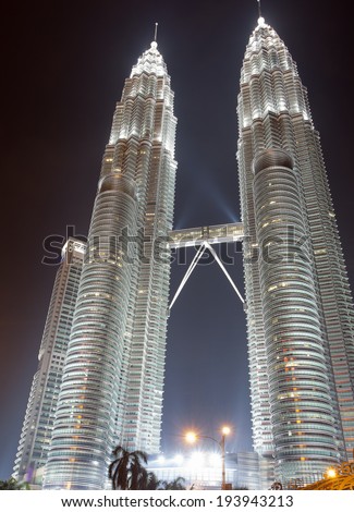 KUALA LUMPUR, MALAYSIA - APR 26: Petronas Twin Towers at night on APR 26, 2014 in Kuala Lumpur. Petronas Twin Towers were the tallest buildings (452 m) in the world from 1998 to 2004.