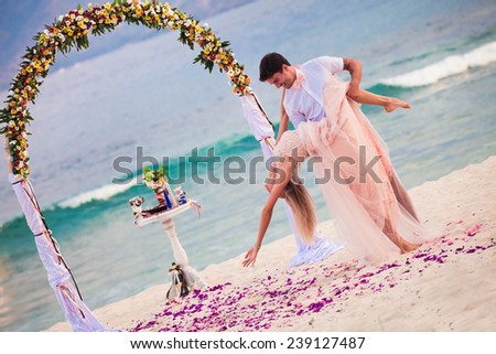wedding couple dancing at the beach at Bali