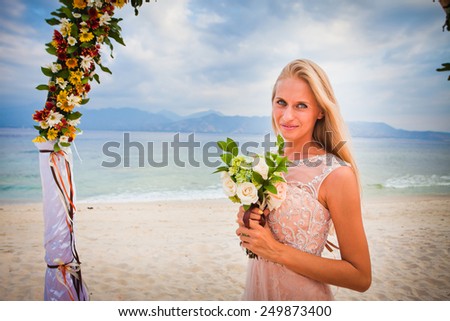 Bride with wedding bouquet, Bali