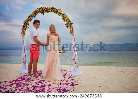 wedding couple just married near the beach at Bali