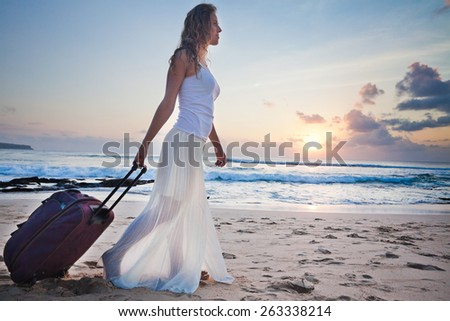 Woman adventure with own luggage at Hawaii
