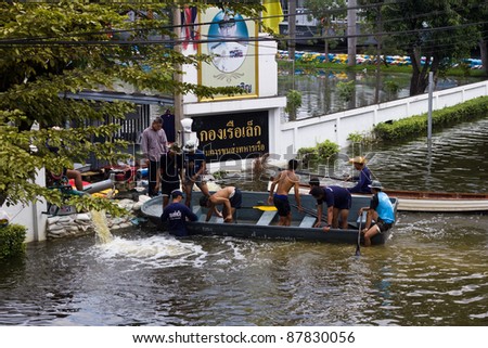 BANGKOK, THAILAND - OCTOBER 30 : The Royal Thai Navy helping  to drain the water out from the building on October 30,2011  Bangkok, Thailand.