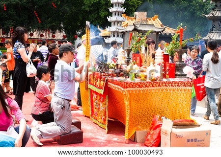 GUANGZHOU, CHINA  - APR 13: Prayer ceremony on Apr 13, 2012 in Mazu Culture Festival. This is China\'s traditional festivals, Held on the Mar 21 lunar each year, Pray for good luck.
