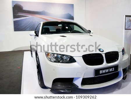 GUANGZHOU, CHINA - JUL 29: BMW M3 car on 2012 Guangzhou Imported Luxury Automobile Exhibition,on July 29, 2012 in Guangzhou China,This is a large international car exhibition