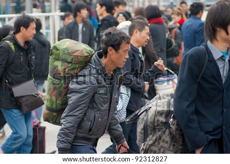 GUANGZHOU, CHINA - JANUARY 8:  Thousands Chinese people leaving city return home for Chinese New Year on Jan 8, 2012,Guangzhou Railway serves 250000 passengers per day.