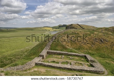 A view along Hadrian\'s wall near Steel Rigg with Milecastle 39 in the foreground. Northumberland National Park