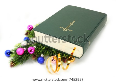 Bible with bookmark on the christmas decorations over the white