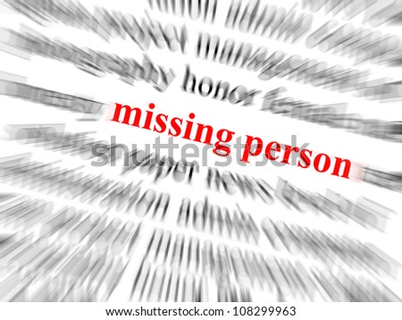The text missing person in red and in focus. Surrounding text blurred with zoom effect.