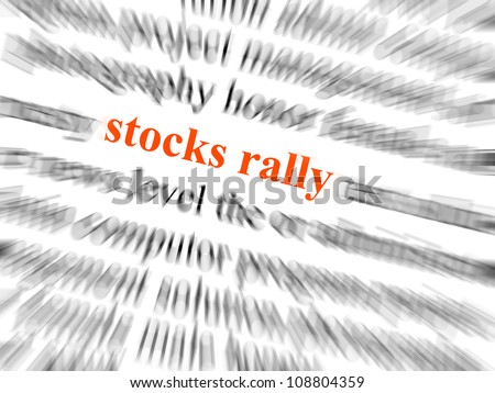 Text stocks rally in red and in focus. Surrounding text blurred with zoom effect.