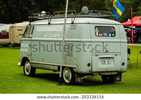 RONNEBY, SWEDEN - JUNE 28, 2014: Nostalgia Festival with classic cars and motorcycles as main attractions. Classic volkswagen type 2 service bus.