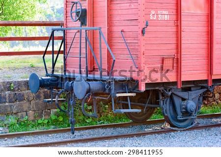 FALUN, SWEDEN - JULY 02, 2015: Detail of an old train wagon standing at the Falu coppermine. SJ logo and id-number visible on wagon side. Wagon is red probably painted with Falu redpaint.